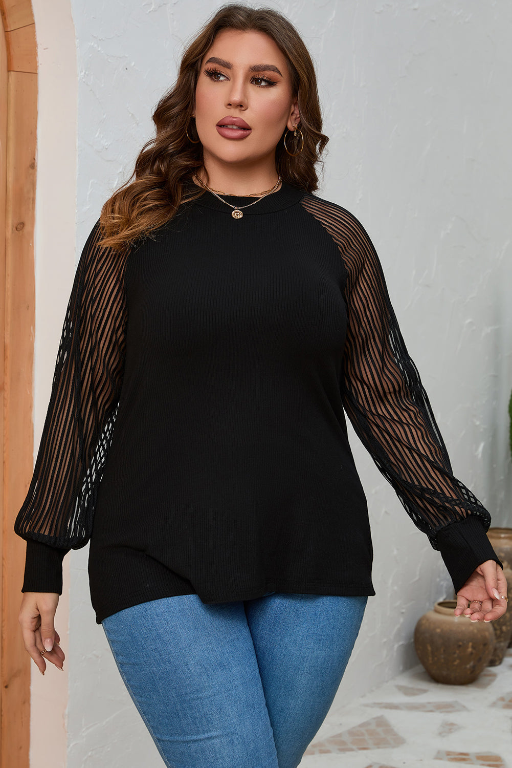 Blusa de manga larga con cuello redondo y talla grande