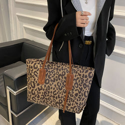 Bolso de mano de piel sintética con estampado de leopardo