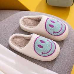 Pantuflas con cara sonriente de Melody