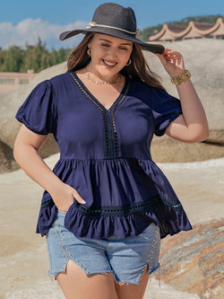 Blusa de manga corta con escote en V y peplum de talla grande