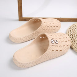 Sandalias planas de PVC con punta redonda