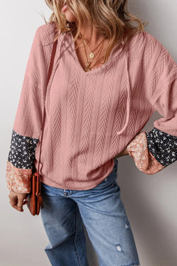 Blusa de manga larga con cuello anudado y bloques de color