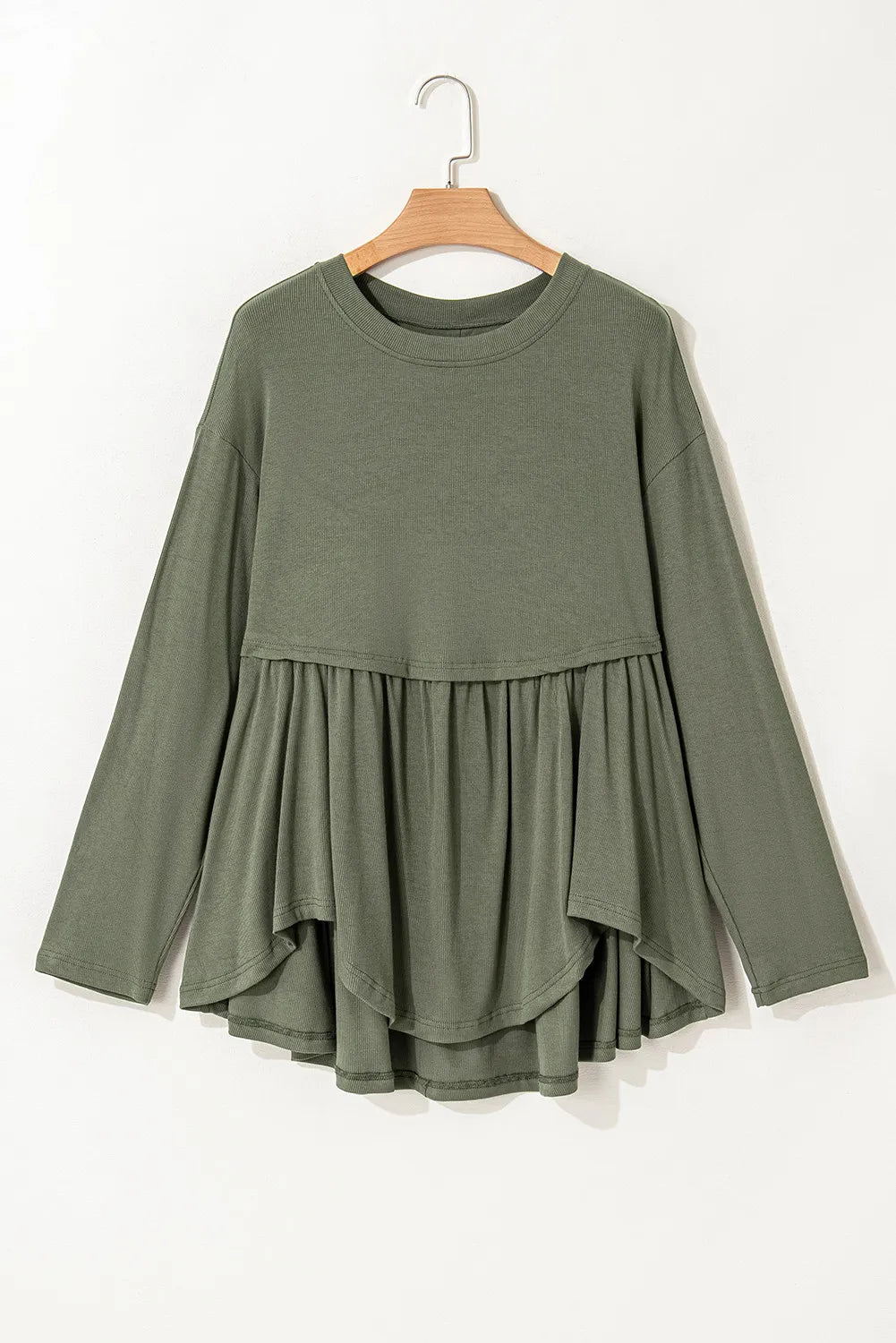 Blusa de manga larga con cuello redondo y peplum en talla grande