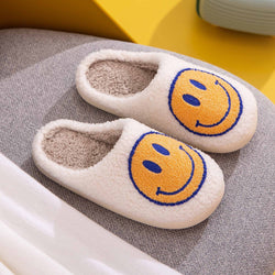 Pantuflas con cara sonriente de Melody