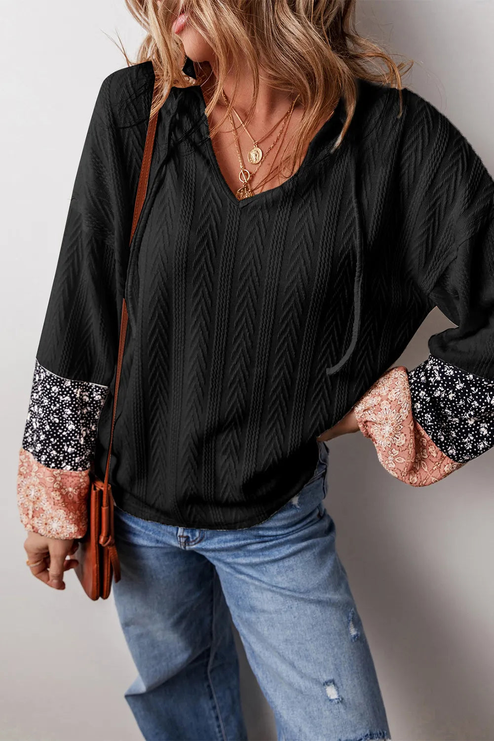 Blusa de manga larga con cuello anudado y bloques de color