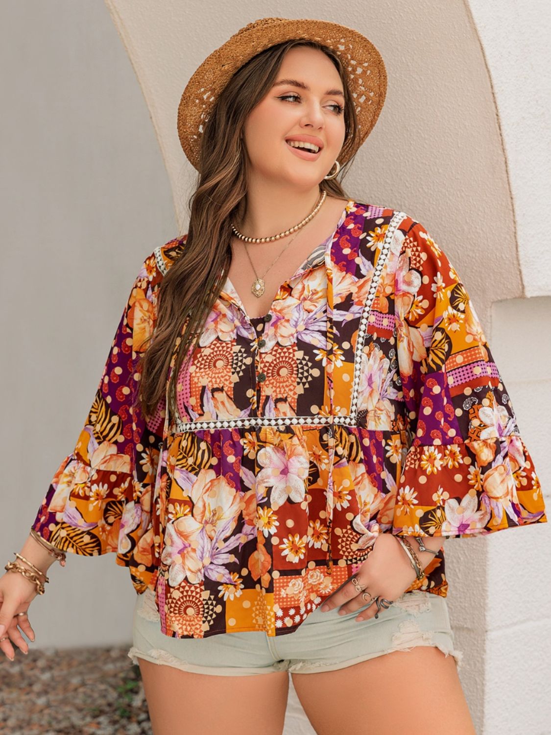 Blusa estampada con lazo en el cuello de talla grande