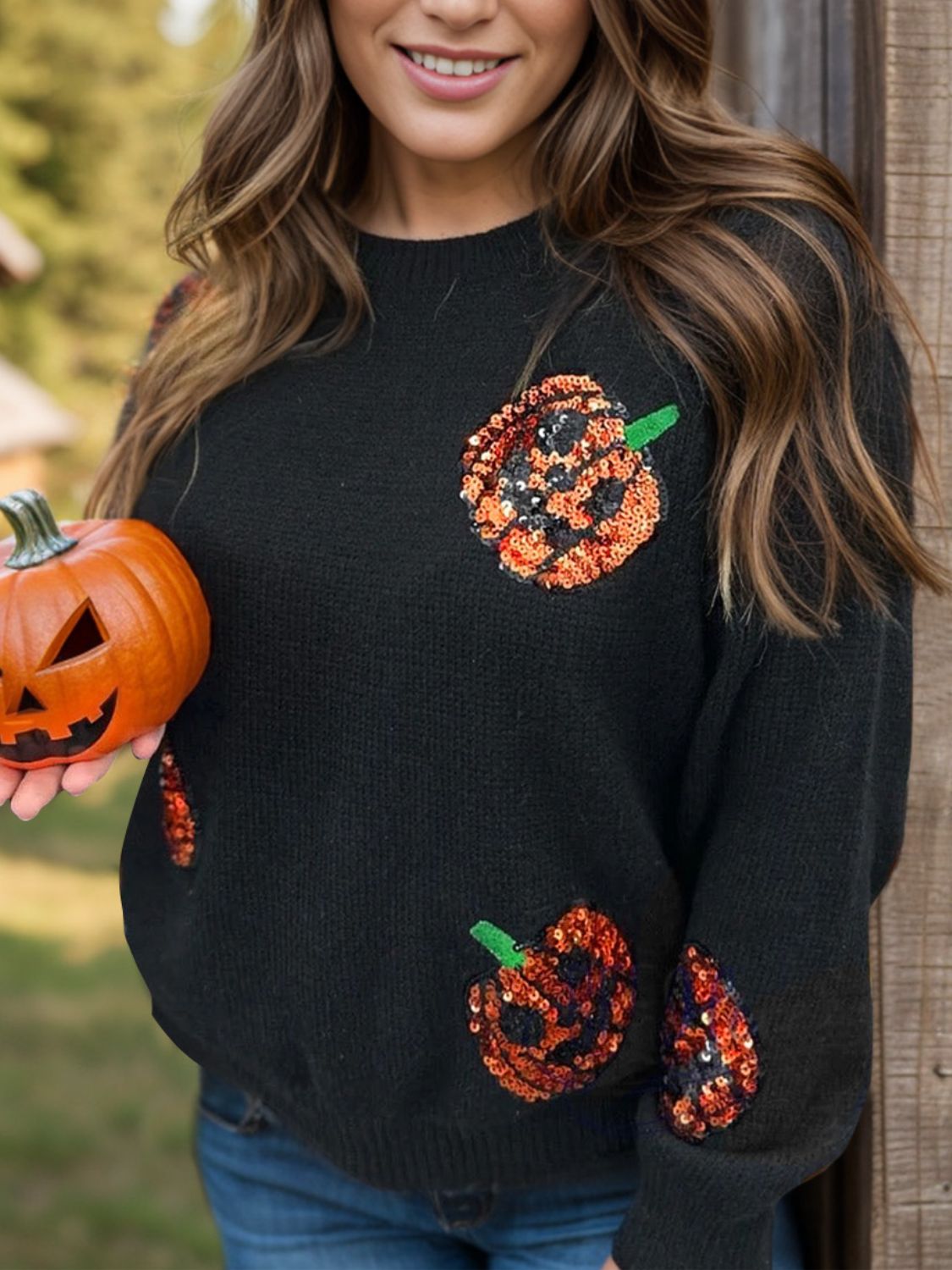 Suéter de cuello redondo con calabaza y lentejuelas de talla grande