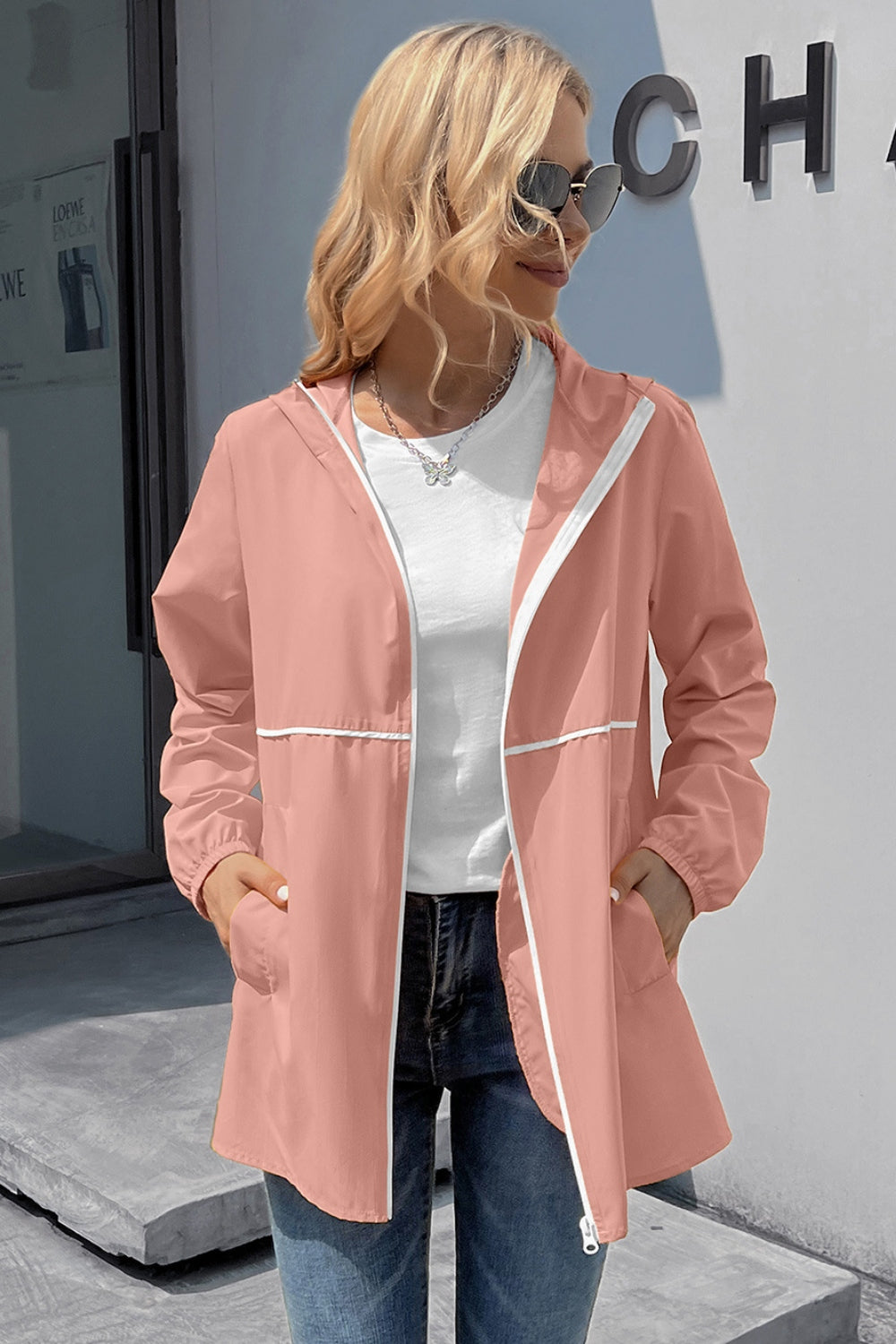 Chaqueta impermeable con capucha y manga larga con cremallera de Ivy Lane