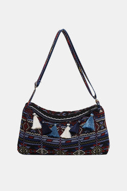 Bolso de hombro con correa ajustable y borlas